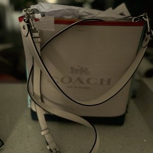 Brand new large Coach bag. Elegant and roomy.